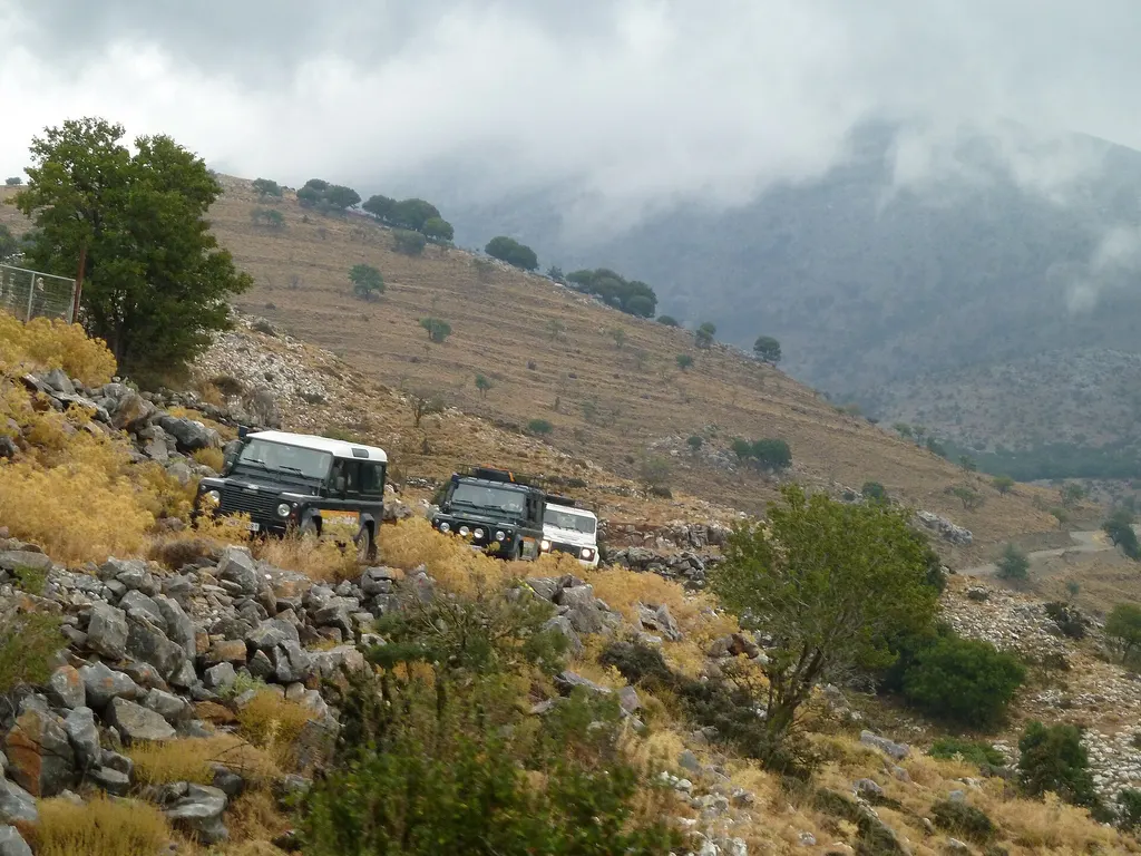 Land Rovers on a hillside track at the Lasithi Plateau (this activity type in Crete)