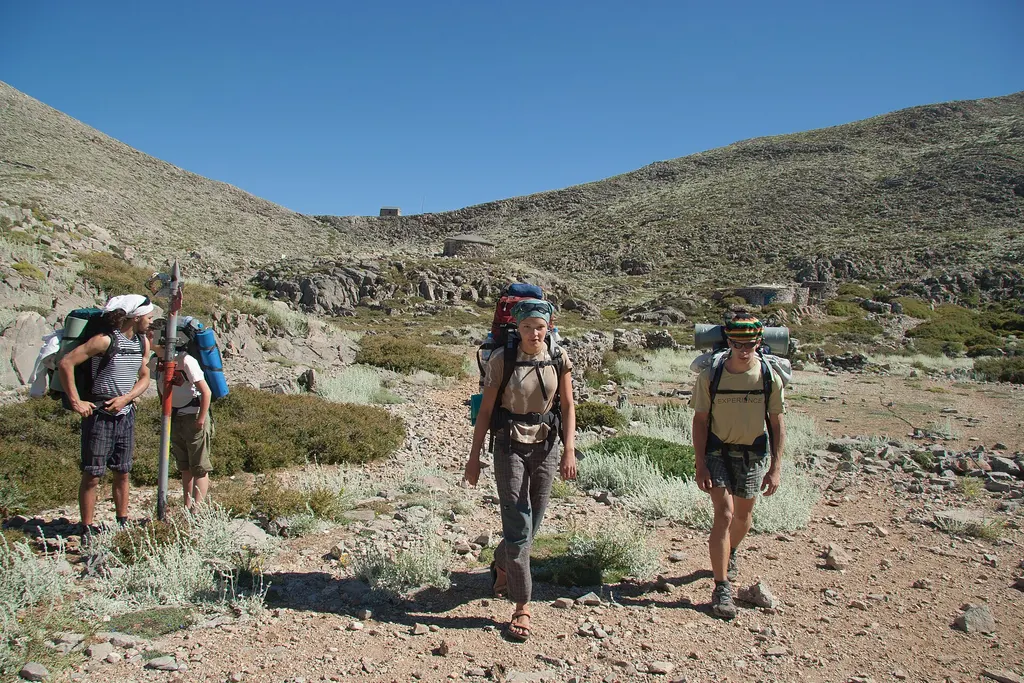 Trekkers leaving the Katsiveli saddle in the Lefka Ori (this activity type in Crete)